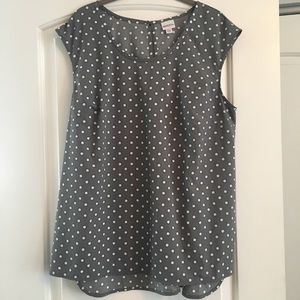 Cute polka-patterned sleeveless blouse